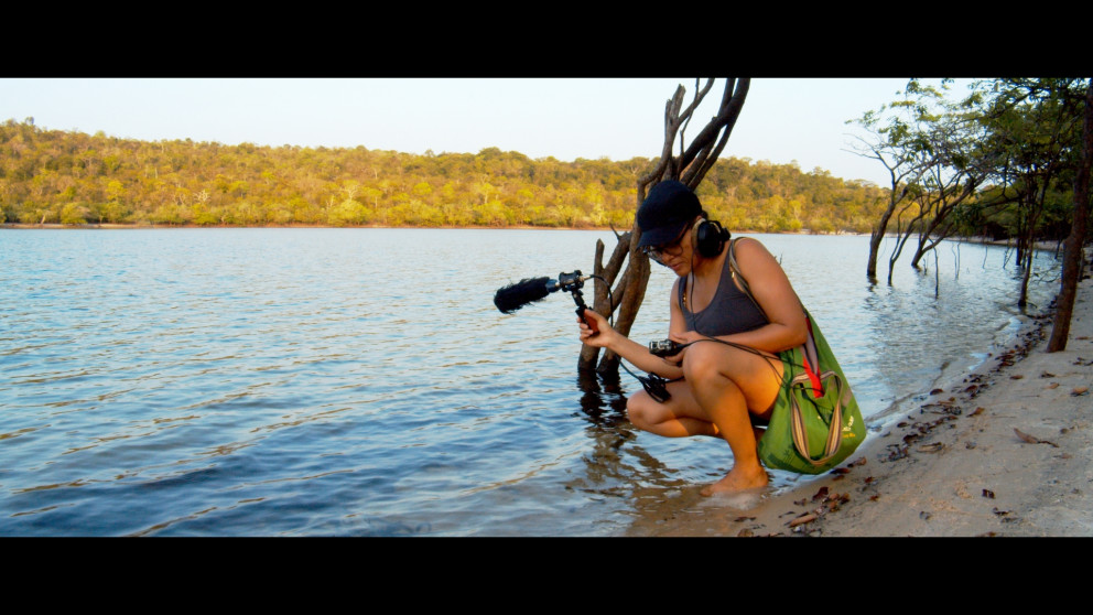 RIFS researcher Cecilia Oliveira recording the sounds of the Amazon.